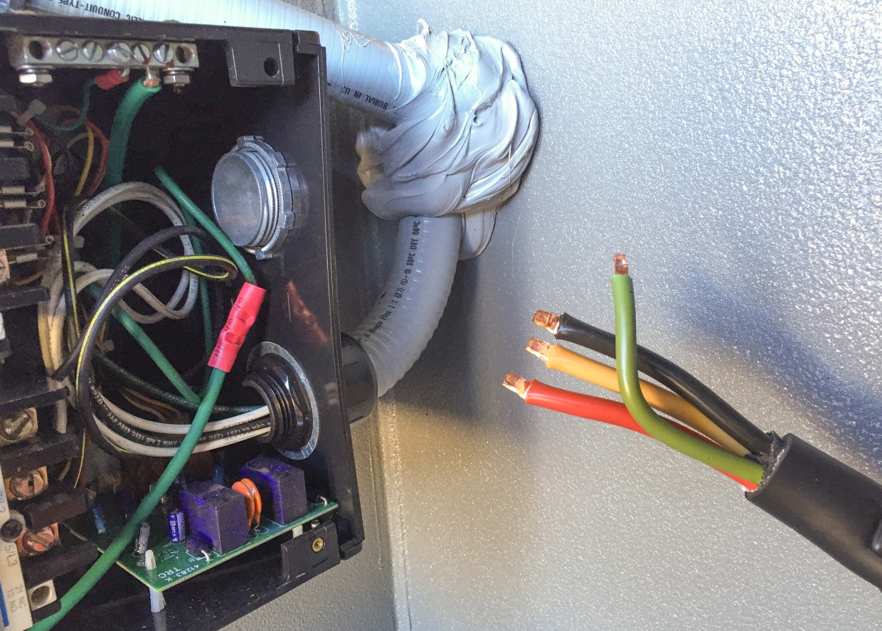 RV power cord disconnected from the existing Surge Guard unit.