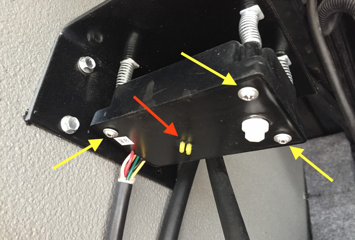Automatic leveler calibration screws and lights.