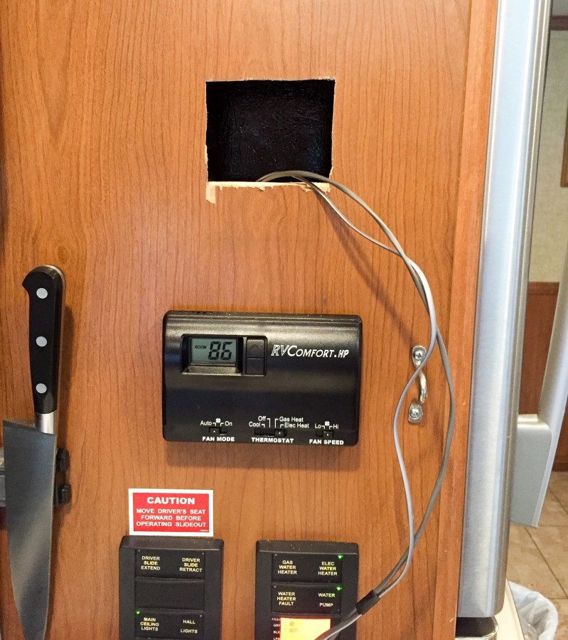 Cutting a hole in the kitchen for the remote monitor and wires.