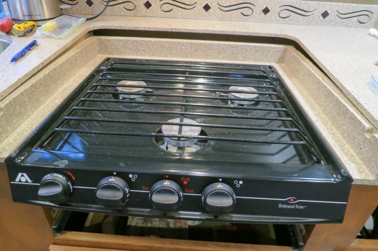 Before: recessed cooktop separated from main countertop.
